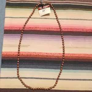 Beautiful boutique bronze beaded necklace.